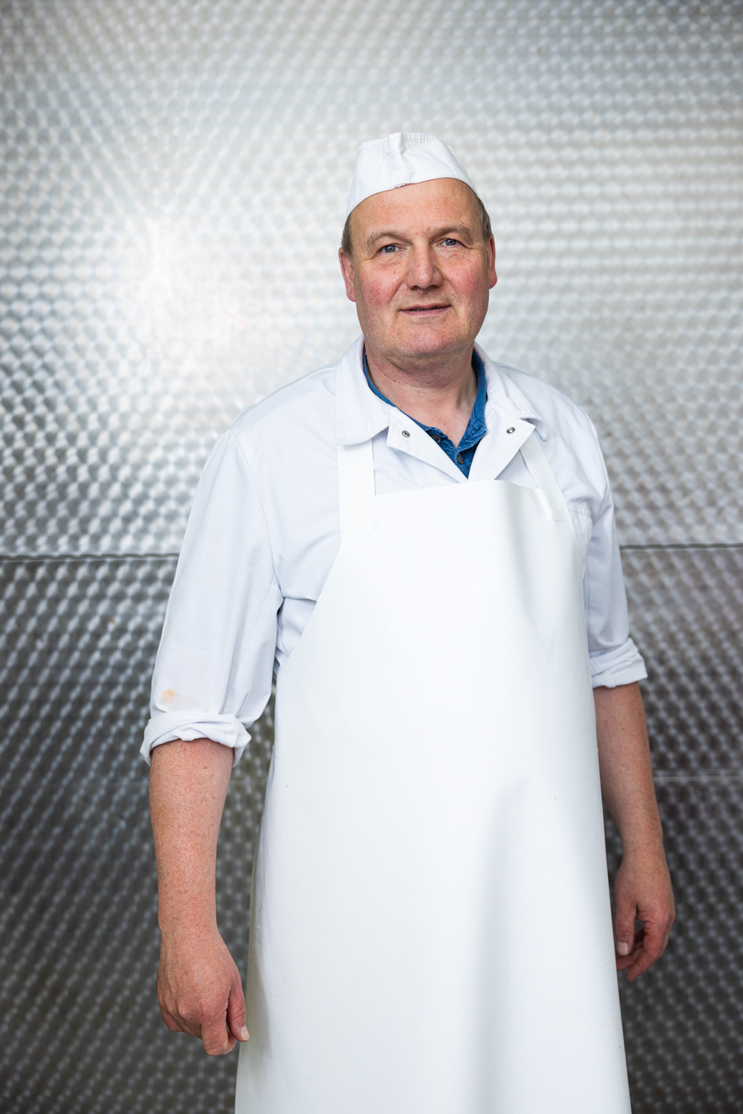 Hier sollte ein Foto eines erfahrenen Metzgers zu sehen sein